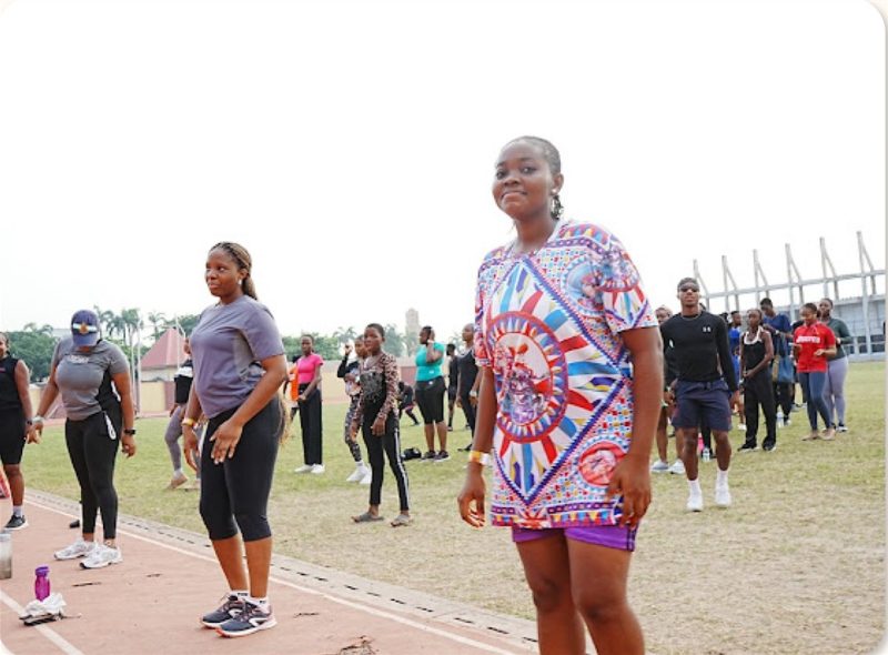 Women joining an outdoor wellness event